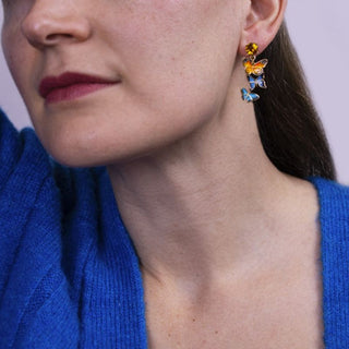 Butterfly Drop Earrings featuring orange and blue butterflies in hand-painted enamel.