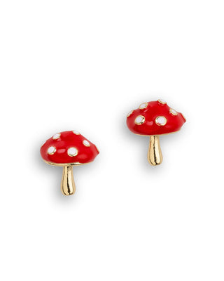 A pair of small toadstool-shaped stud earrings with glossy red caps, white polka dots, and gold stems on a plain white background.