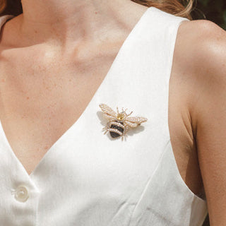 Style shot of Bill Skinner Studio's Bejewelled Pearl Bee Brooch