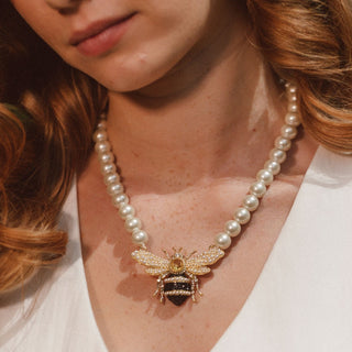 Woman wearing Bejewelled Pearl Bee Necklace