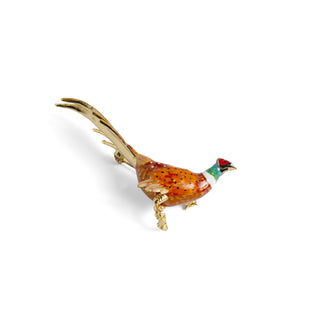 Colorful enamelled pheasant brooch on a white background