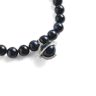 Dark blue beaded sandstone necklace with silver clasp on a white background

