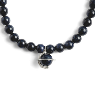 Dark blue beaded sandstone orb celestial necklace with silver clasp on a white background

